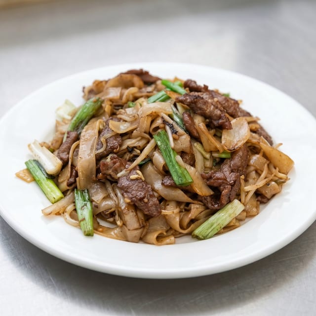 Beef Chow Fun with Flat Rice Noodles Szechwan Style.